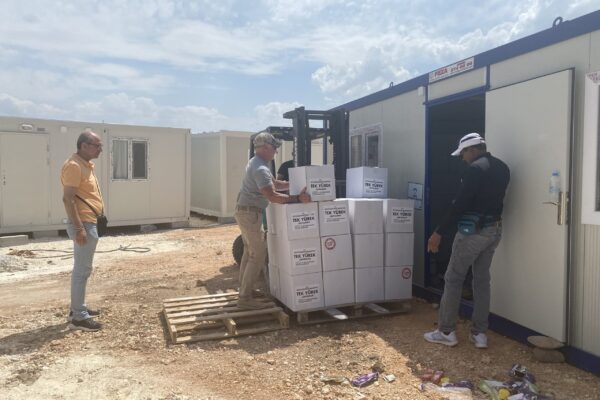 The rescue team is busy putting together a temporary settlement comprised 680 containers, housing a kindergarten and a hospital.
