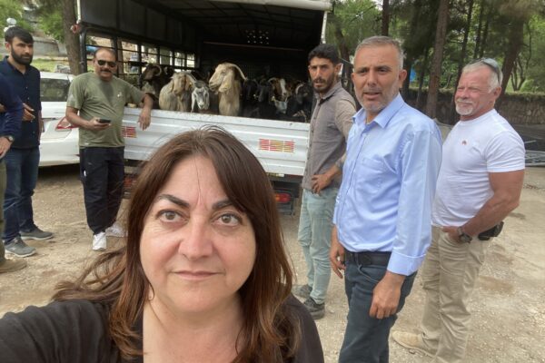 MediaLocate's Ilge is taking a selfie with the team who will deliver the goats to the farmers in the mountain villages devastated by the recent Turkey earthquake.